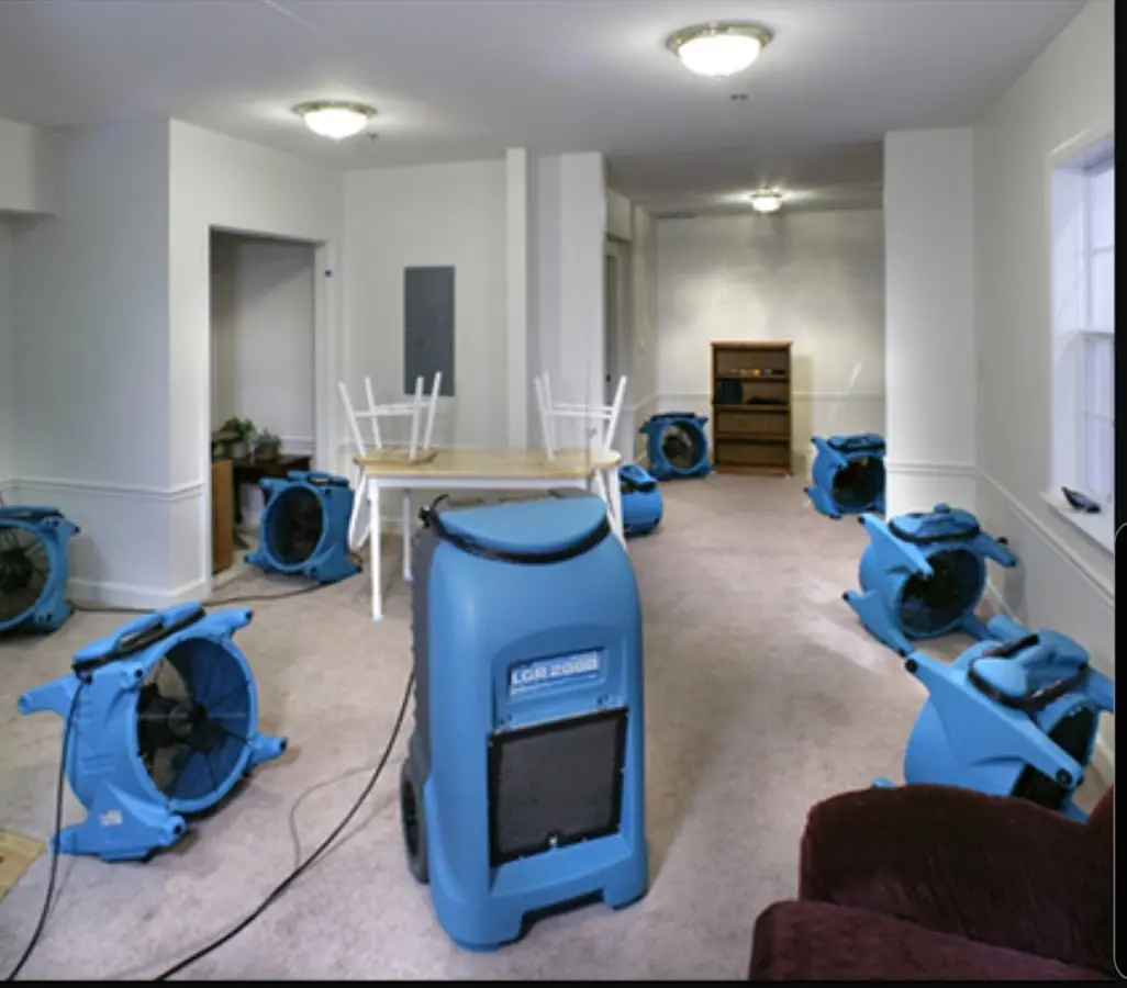 Air movers and dehumidifier setup for Water Damage Restoration in Huntington